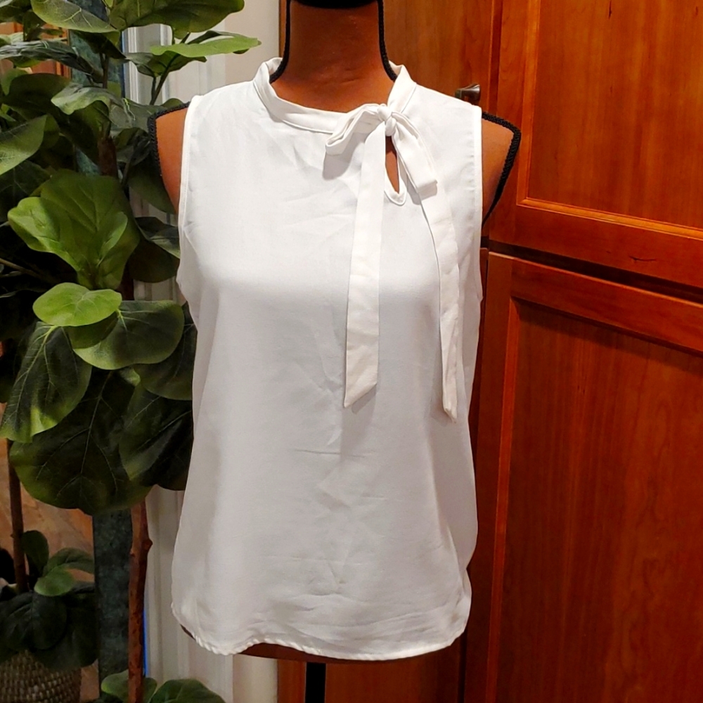 White sleeveless top